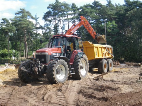 New Holland G210