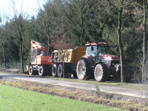 Afgraven en maken bedding 1